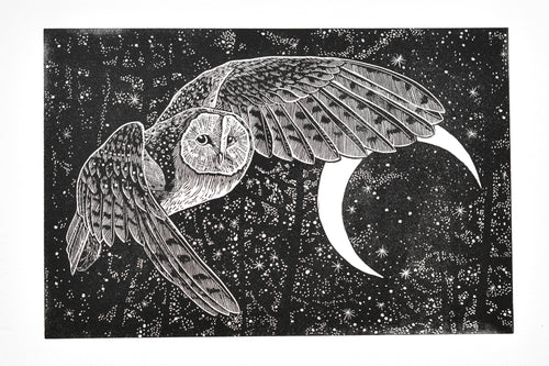 A black and white linocut print of a barn owl in flight against a starry night sky with a crescent moon.