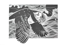Load image into Gallery viewer, Black and white hand carved linoprint illustration of a puffin bird flying with a starry background 
