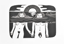 Load image into Gallery viewer, Black and white illustration linocut print of two people emerging from water with a sunset in the background.
